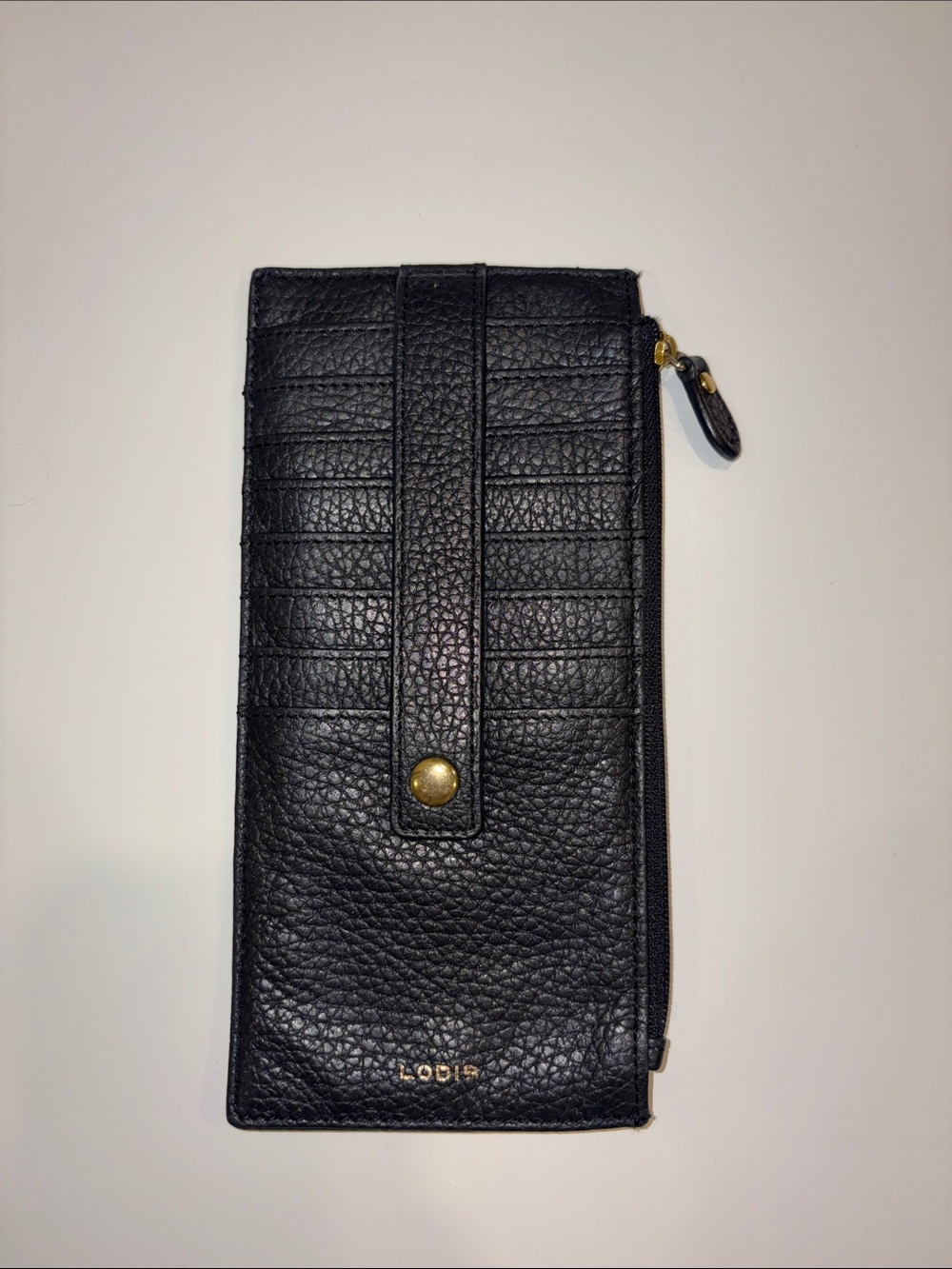 Lodis Black Pebbled Leather Zip Wallet with Snap Strap and Gold Accents